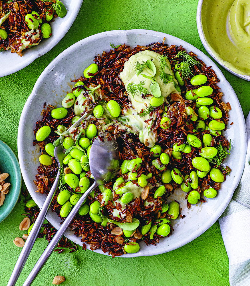 Crispy rice salad with edamame, peanuts and avocado-tahini drizzle