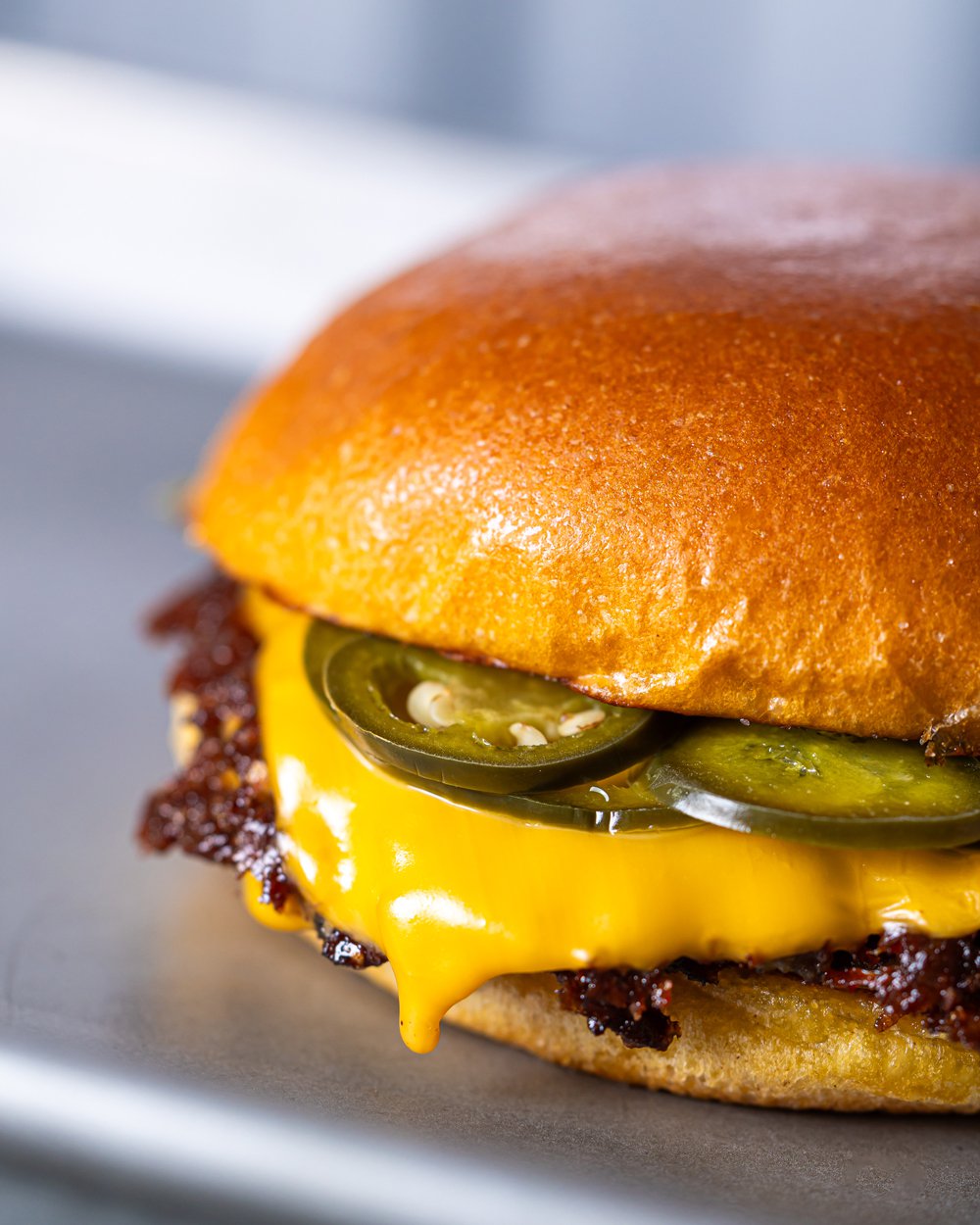 The juicy patties and melted cheese at Junk Smash Burger will delight diners