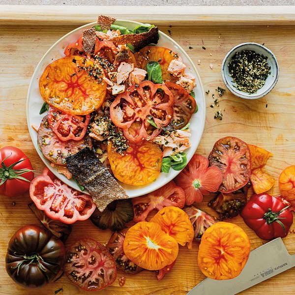 Mixed tomato salad with salmon skin croutons and nori sprinkle