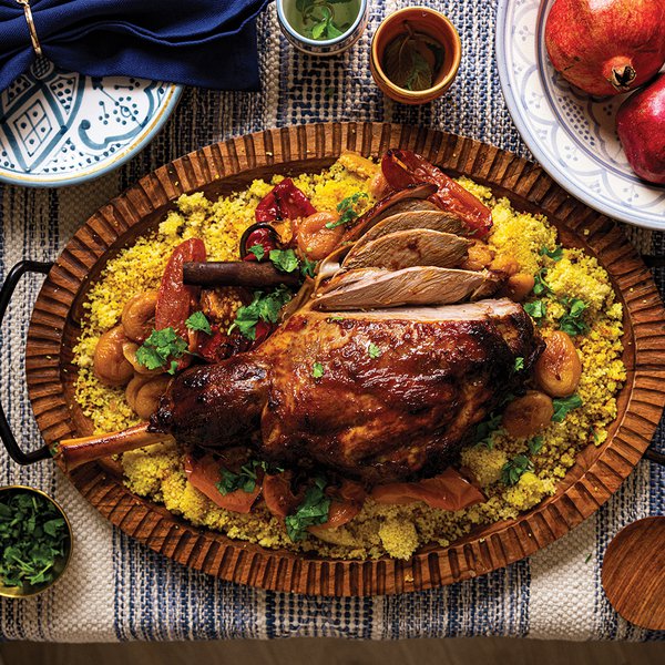 Rose harissa and apricot roasted leg of lamb with crispy saffron couscous