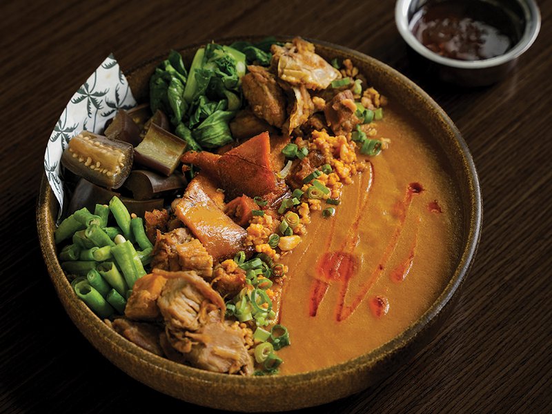 Serving up the restaurant’s halo halo │ Kooya’s kare kare, featuring a smoked peanut gravy