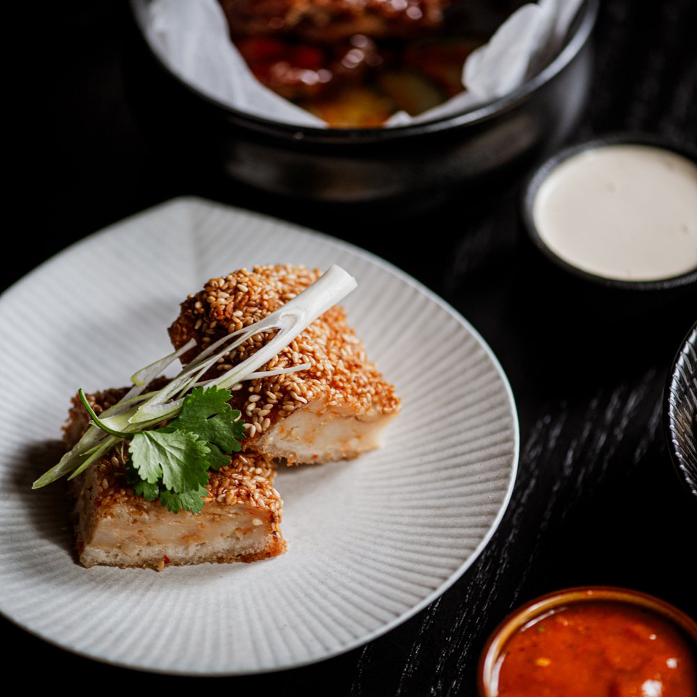 Crisp prawn toast with glossy red pepper sweet chilli sauce at The Red Room