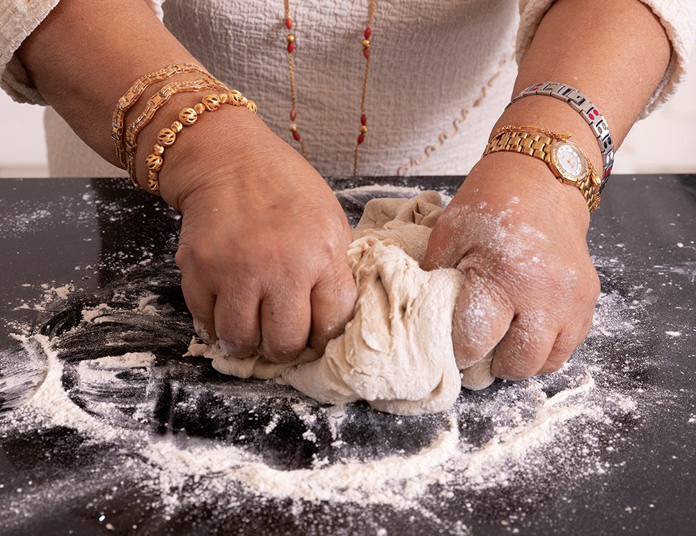 Bibi is an expert at making mandazi without referring to a recipe