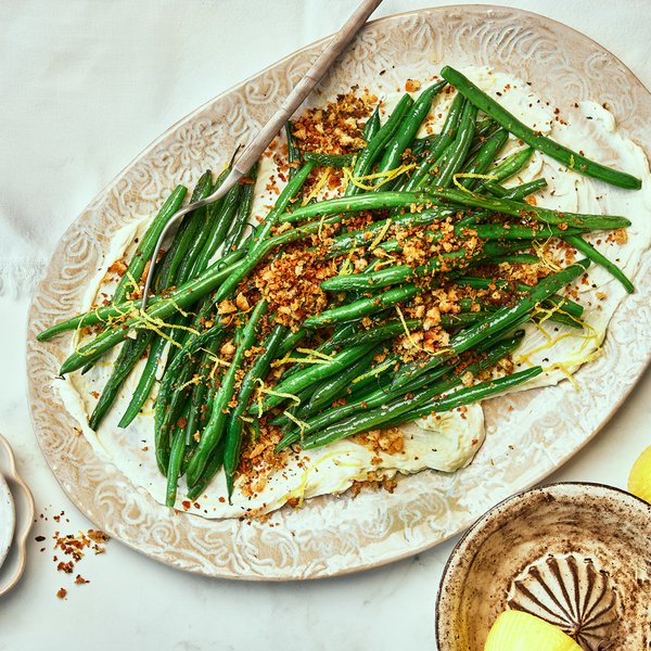 Whipped goat’s cheese with garlic green beans and herby pangrattato