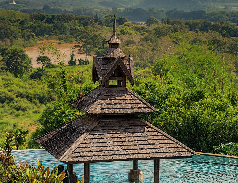 The resort’s infinity pool offers uninterrupted views of the verdant jungle all around