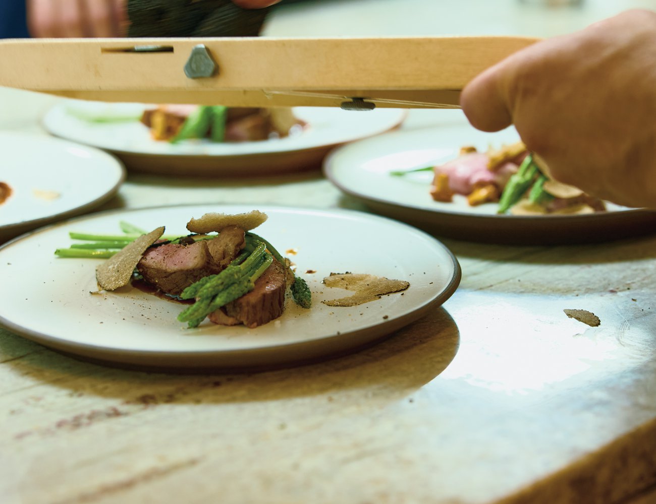 Lamb with wild asparagus, chanterelles and summer truffle at Chez Pimousse