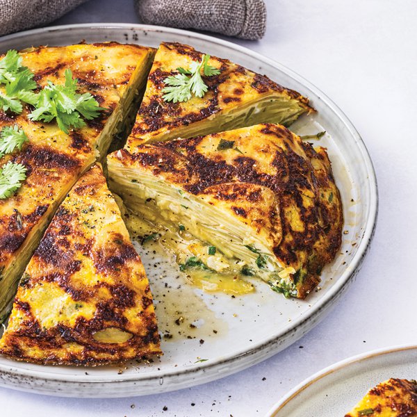 Spanish tortilla with green olives and fruit