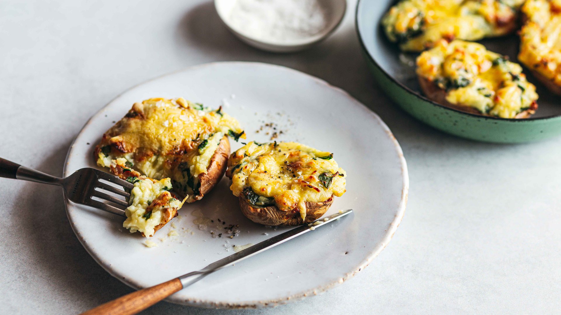 Twice-baked potatoes with spinach and cheddar