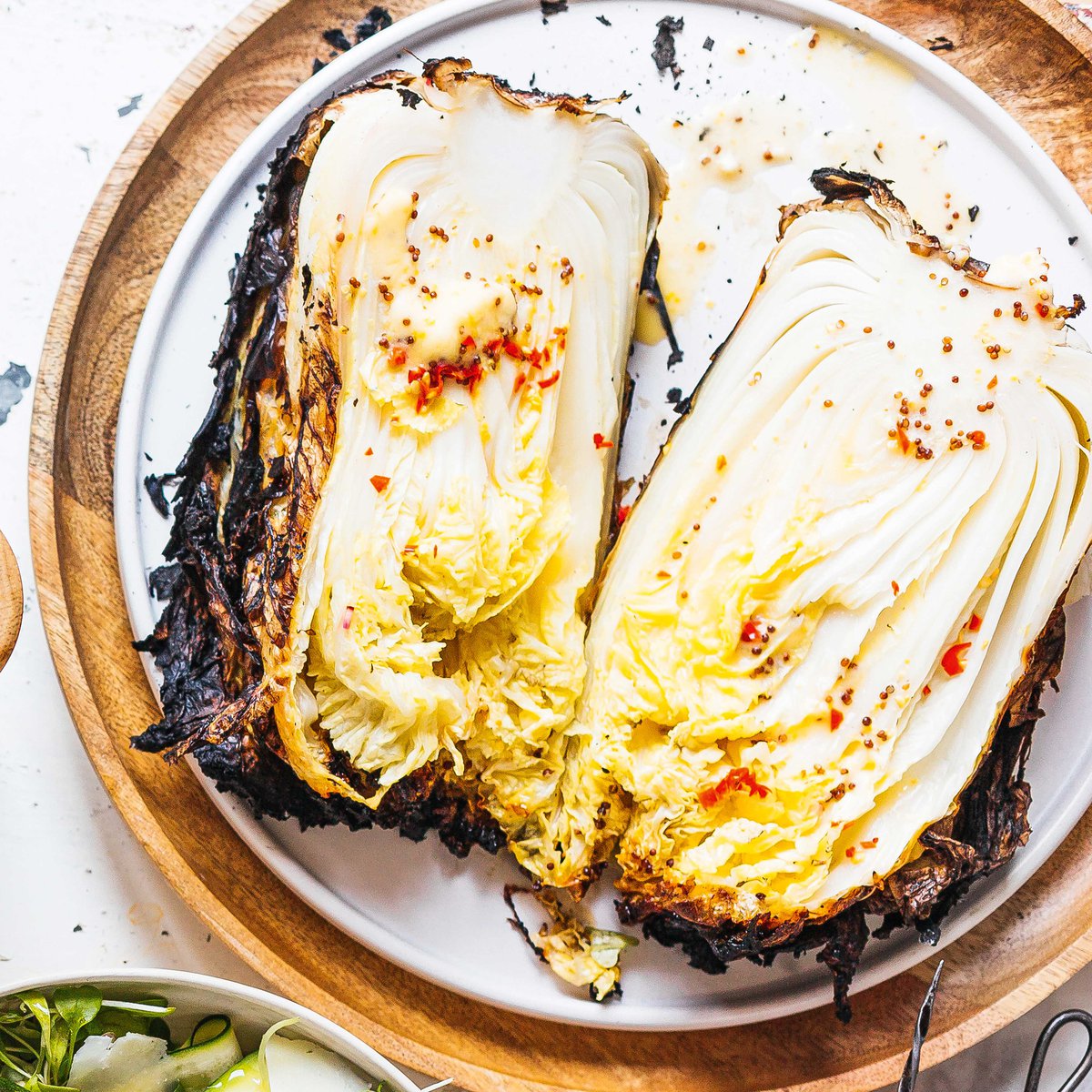Whole cabbage in the coals with honey-mustard butter