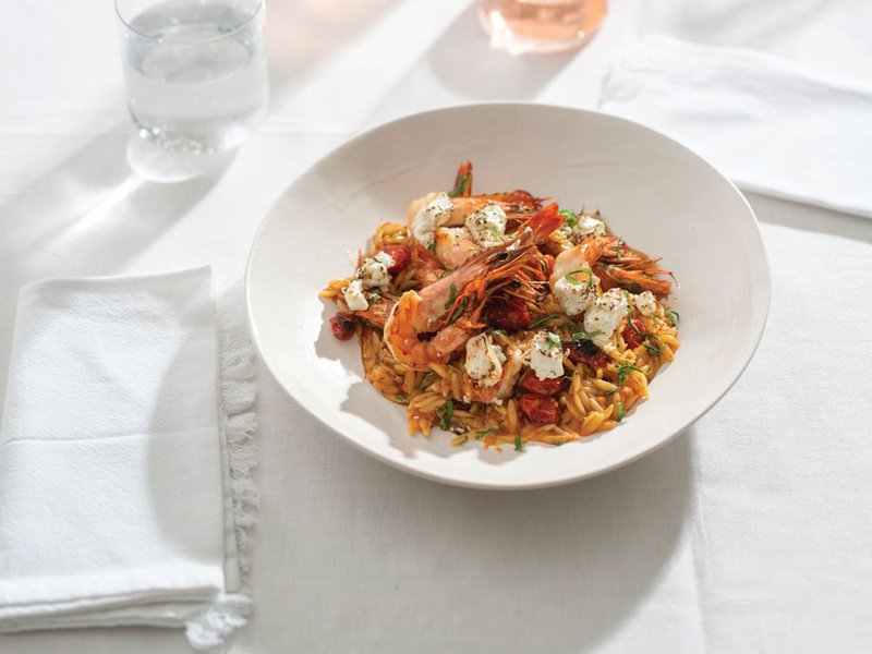 The sole meunière has been inspired by Natasha’s trips to Paris | The book is filled with original art | The saganaki prawns gets it name from the pan in which it’s prepared