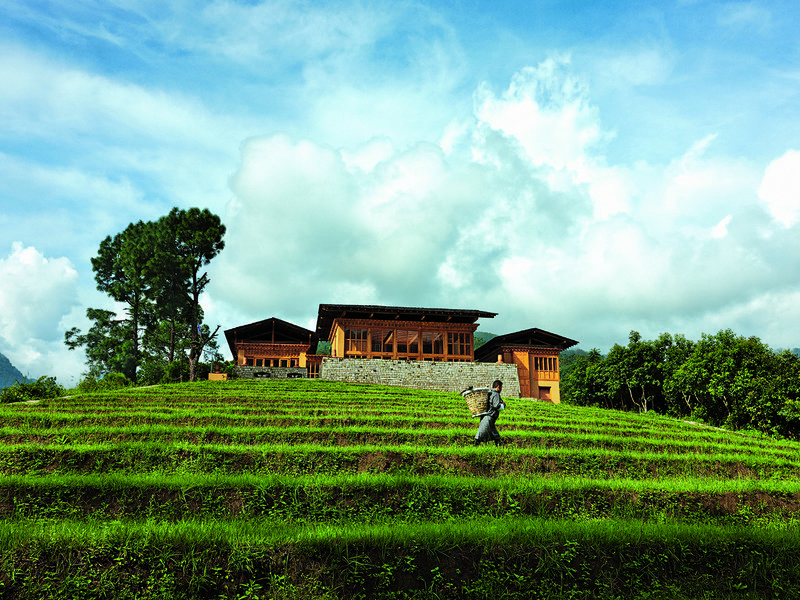 The main lodge at COMO Uma Paro | Khamsum Yulley Namgyal Chorten | COMO Uma Punakha sits seamlessly atop terraced rice paddies