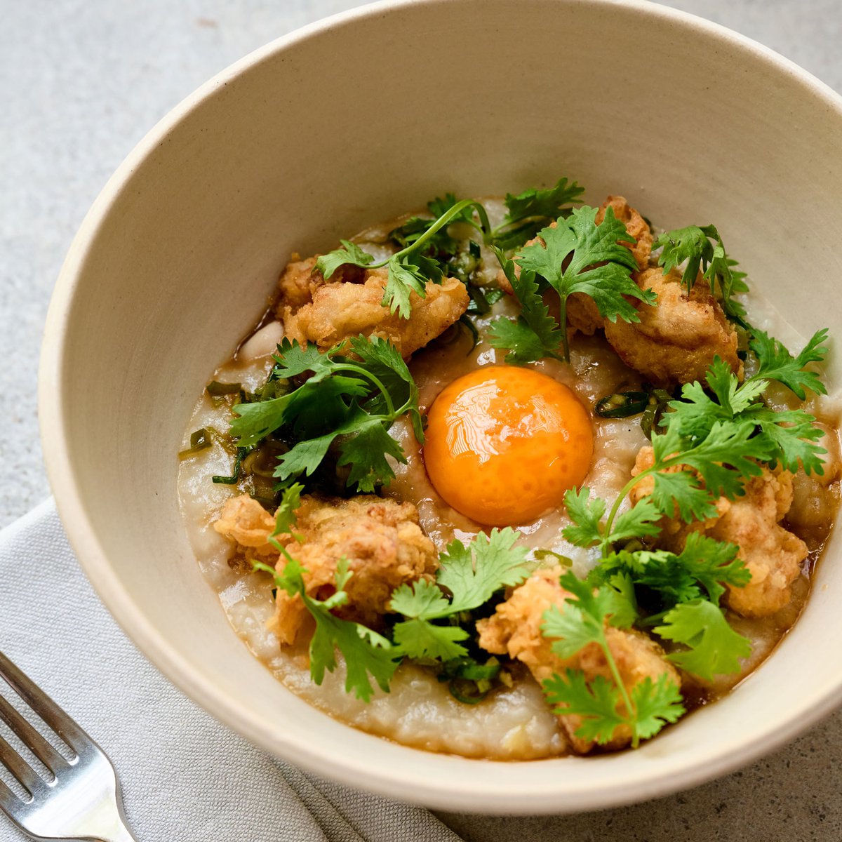 Rice congee with chicken, spring onion &amp; ginger sauce