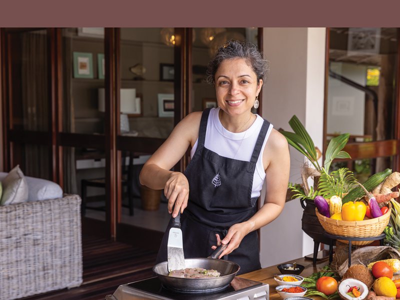 A Creole cooking class teaches guests to make a traditional garden curry and fish steaks  │ The waters of Petite Anse Bay offer excellent swimming and snorkelling  │ Grilled seafood platter at Kannel restaurant