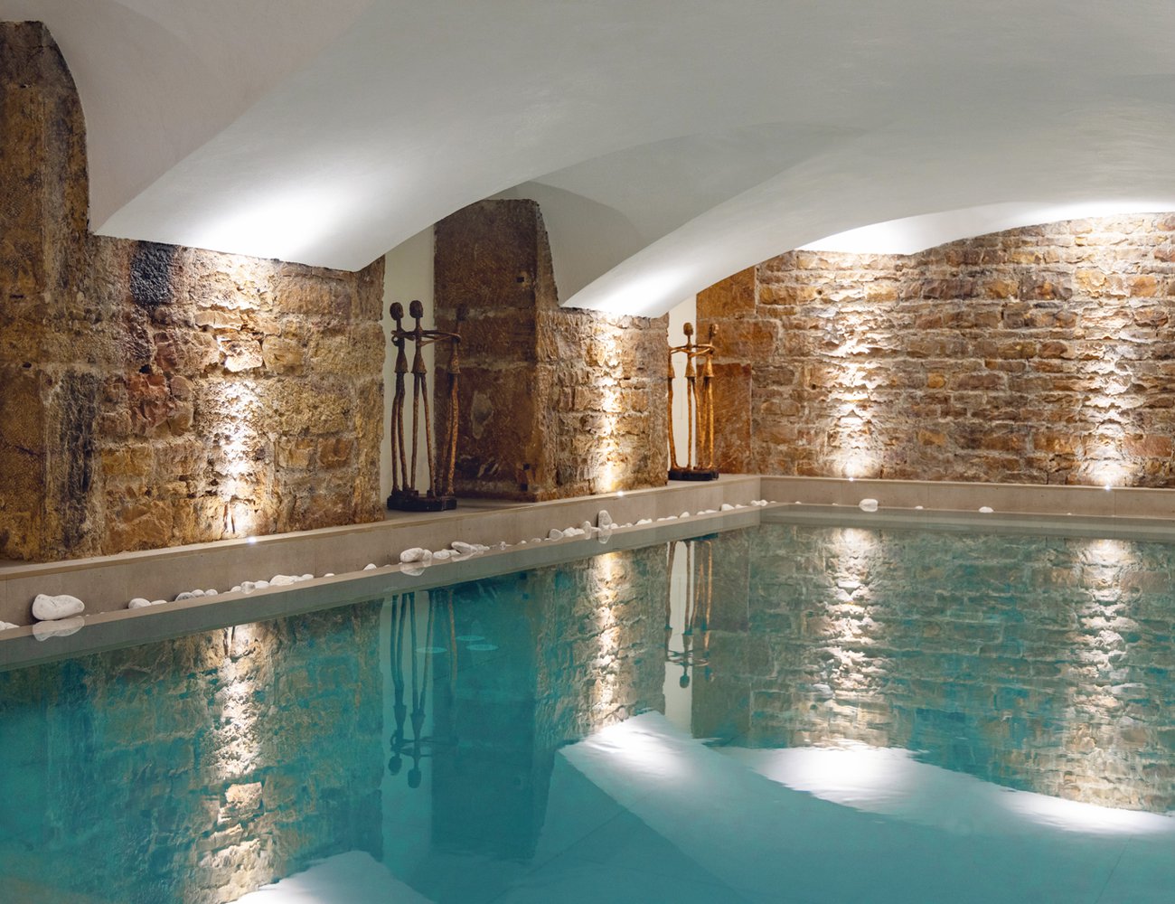 Heated indoor pool at Boscolo Lyon’s spa retreat