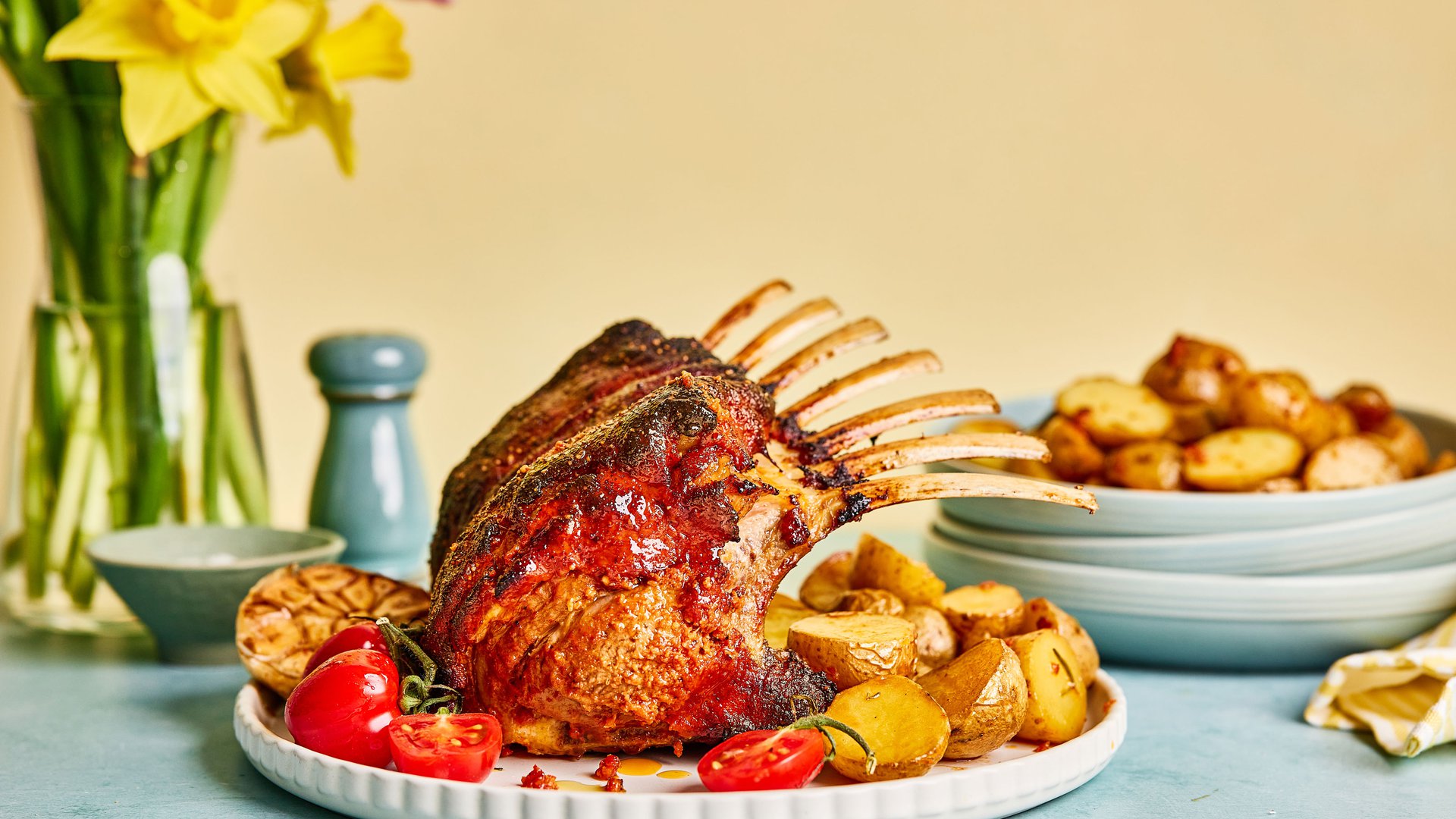 Lamb rack with tomato crust and roast potatoes