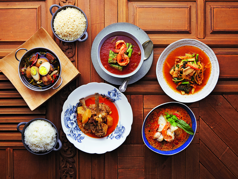 A section of Thai homestyle dishes at Baan, including the spicy, five-spiced egg soup | Giant butterflied lake prawn served at Le Du | Chef Ton and his brother Tam – two of Bangkok’s most hospitable chefs
