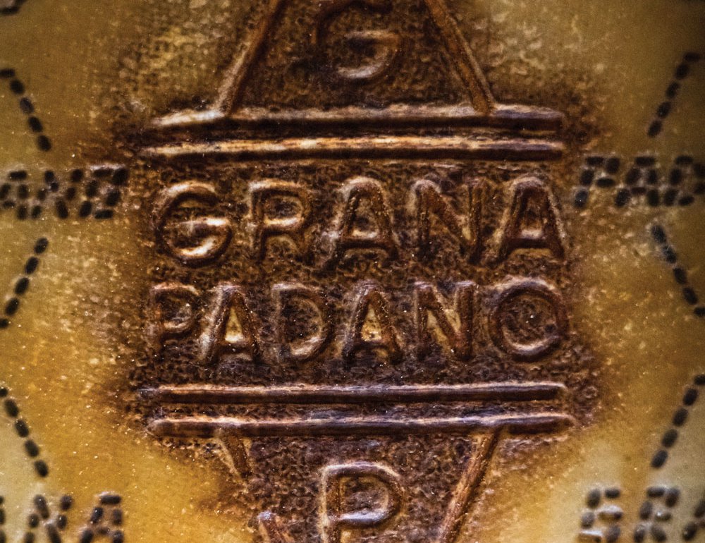 The official Grana Padano stamp is only placed on a wheel once it has aged for a minimum of nine months