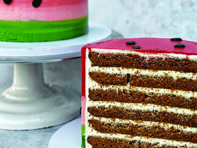 Nadia’s watermelon cake designed to raise money for charity in Gaza │ Quality control is important to the Dubai-based baker │ Nadia works on bespoke cake designs for her customers │ Edible wax paper was used to create the messaging │ Telling stories through cake designs