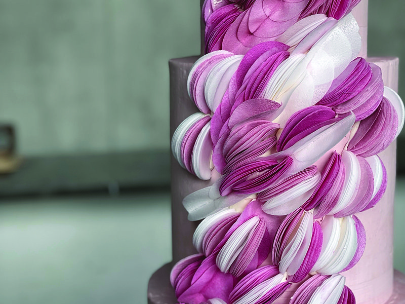 Nadia’s watermelon cake designed to raise money for charity in Gaza │ Quality control is important to the Dubai-based baker │ Nadia works on bespoke cake designs for her customers │ Edible wax paper was used to create the messaging │ Telling stories through cake designs