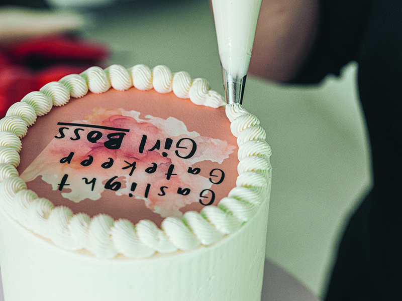 Nadia’s watermelon cake designed to raise money for charity in Gaza │ Quality control is important to the Dubai-based baker │ Nadia works on bespoke cake designs for her customers │ Edible wax paper was used to create the messaging │ Telling stories through cake designs