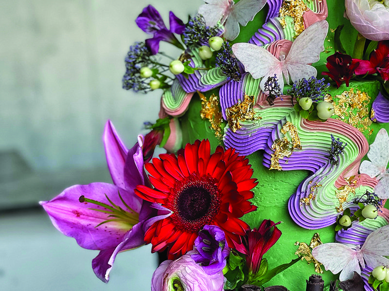 Lighting the ‘burn’ cake │ A Lambeth-style cake │Nadia works on her cakes with extreme precision │ Ikebana floral arrangements are a current trend