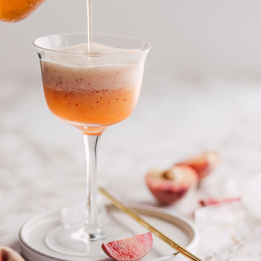 Peach and kombucha bellini