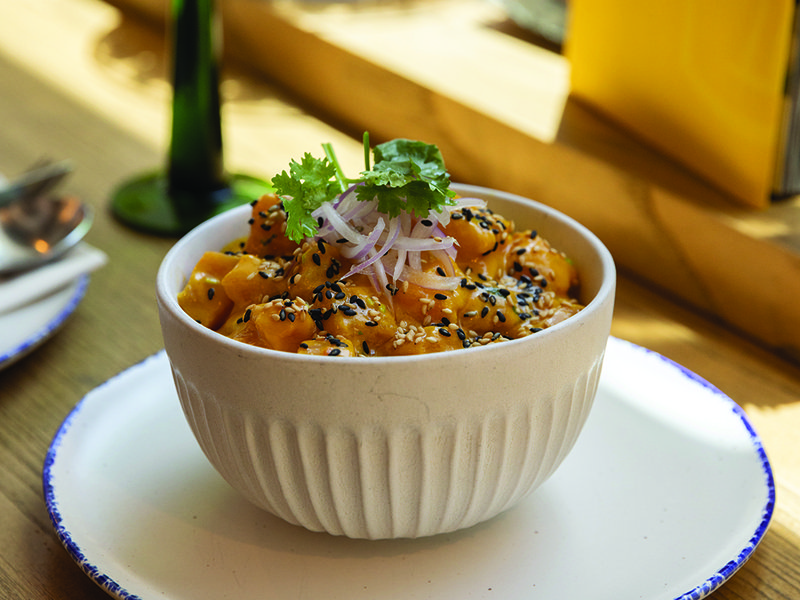 The clásico ceviche is a taste sensation combining citrus flavours and crunchy textures that keeps you going back for seconds and thirds | Fusion Ceviche’s interiors pay homage to Peruvian culture | Mango salmon ceviche | Penelope uses a blow torch to char an avocado for one of her star ceviches