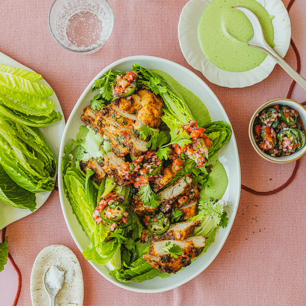 Crunchita lettuce with strawberry salsa, cajun chicken and green goddess feta dressing