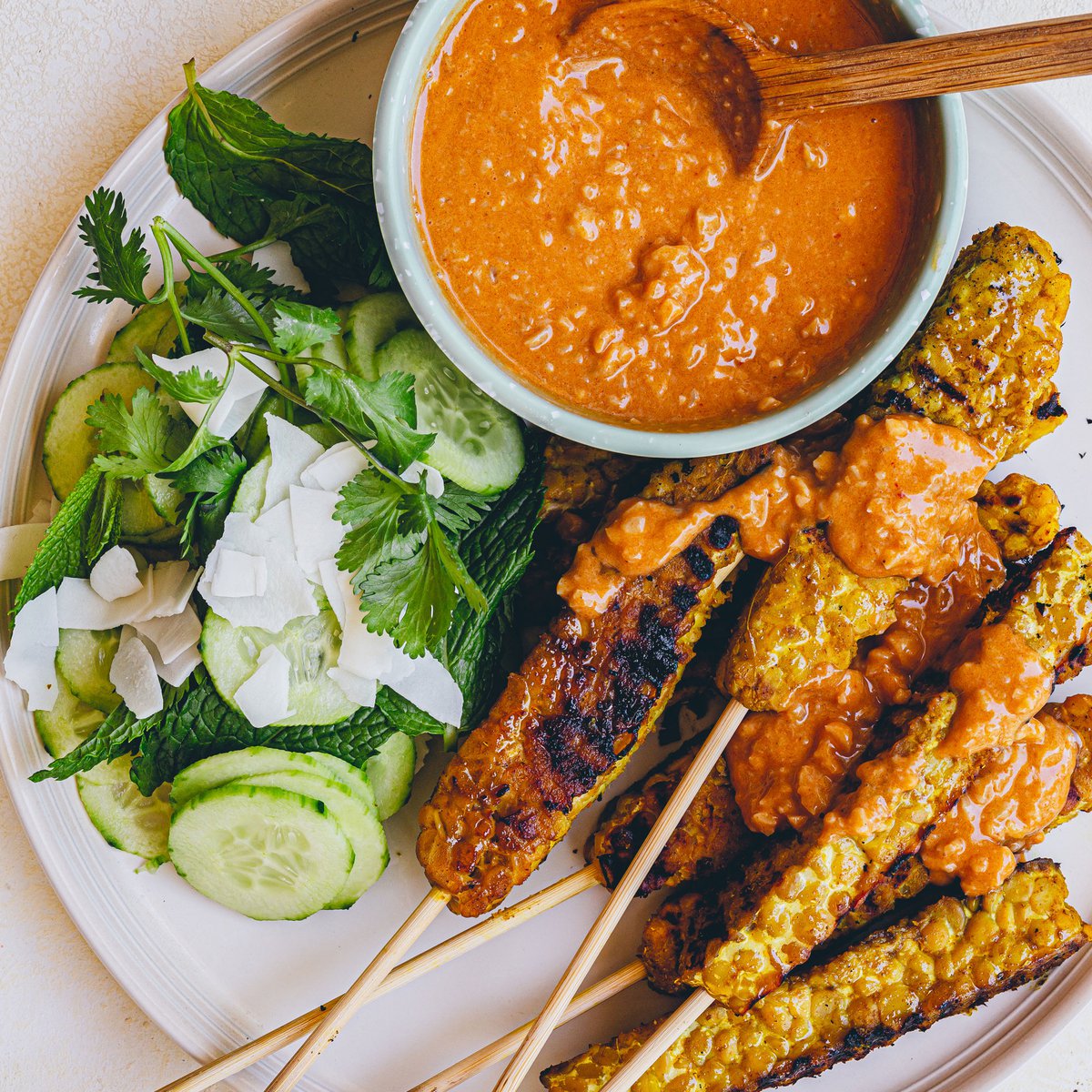 Tempeh satay with cucumber sambal